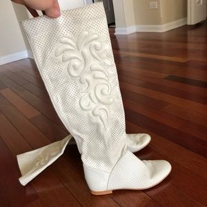 Perforated leather boots.